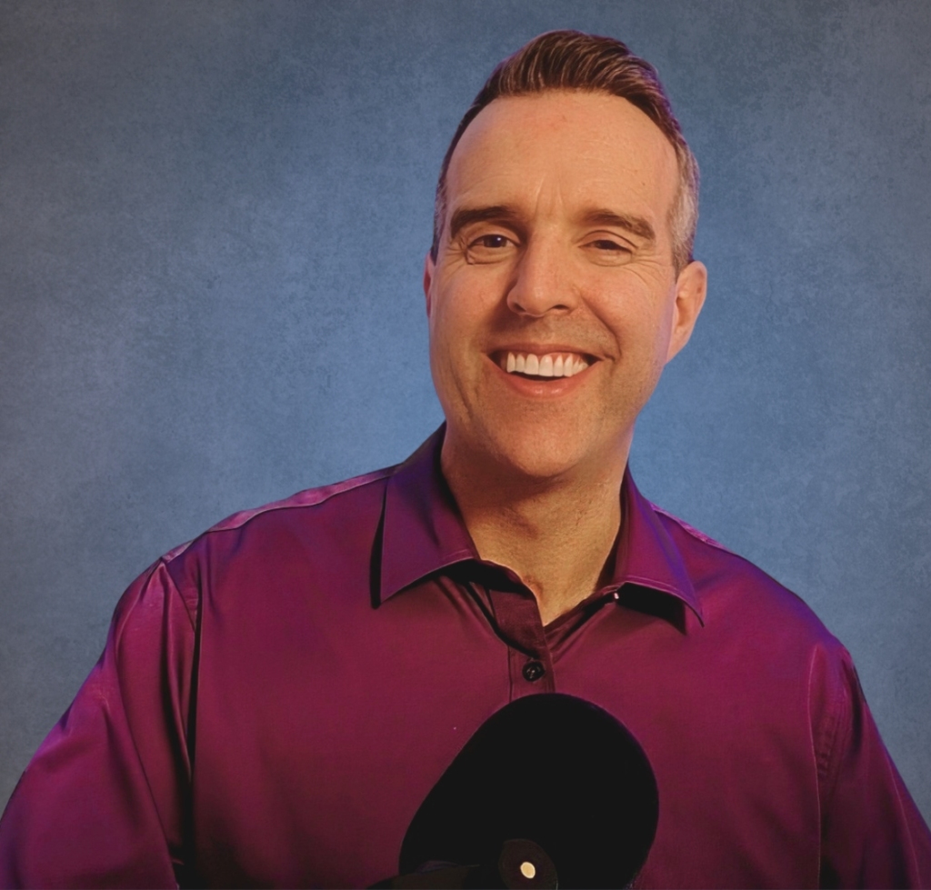 Ken Knoechel smiling as he represents himself for his website